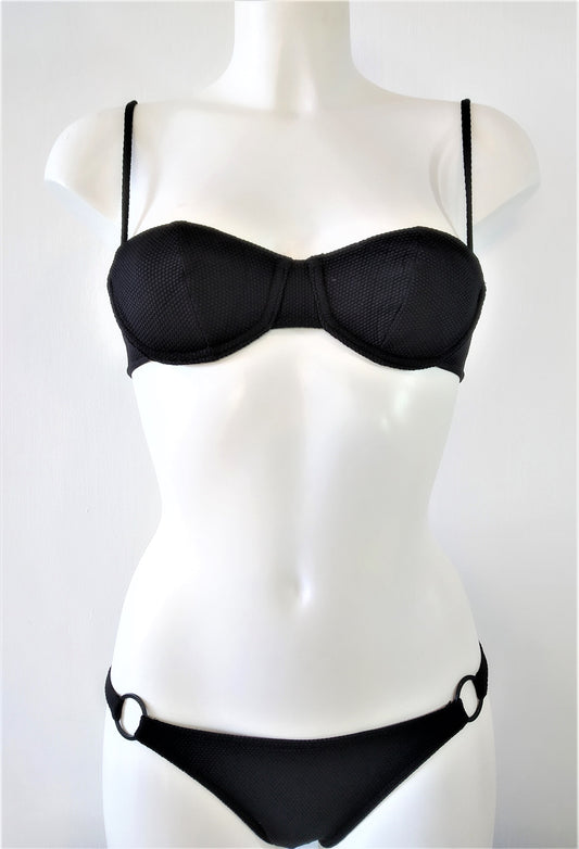 black bikini set, strapless lightly padded bra, regular bikini bottom, embellished with one flat black ring on each sides. bikinn.com