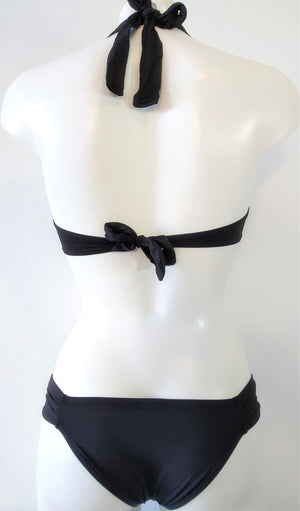 back view of a black bikini swimsuit with low cheeky bottom and bandeau bra tied behind back and neck. bikinn.com bikini collection.