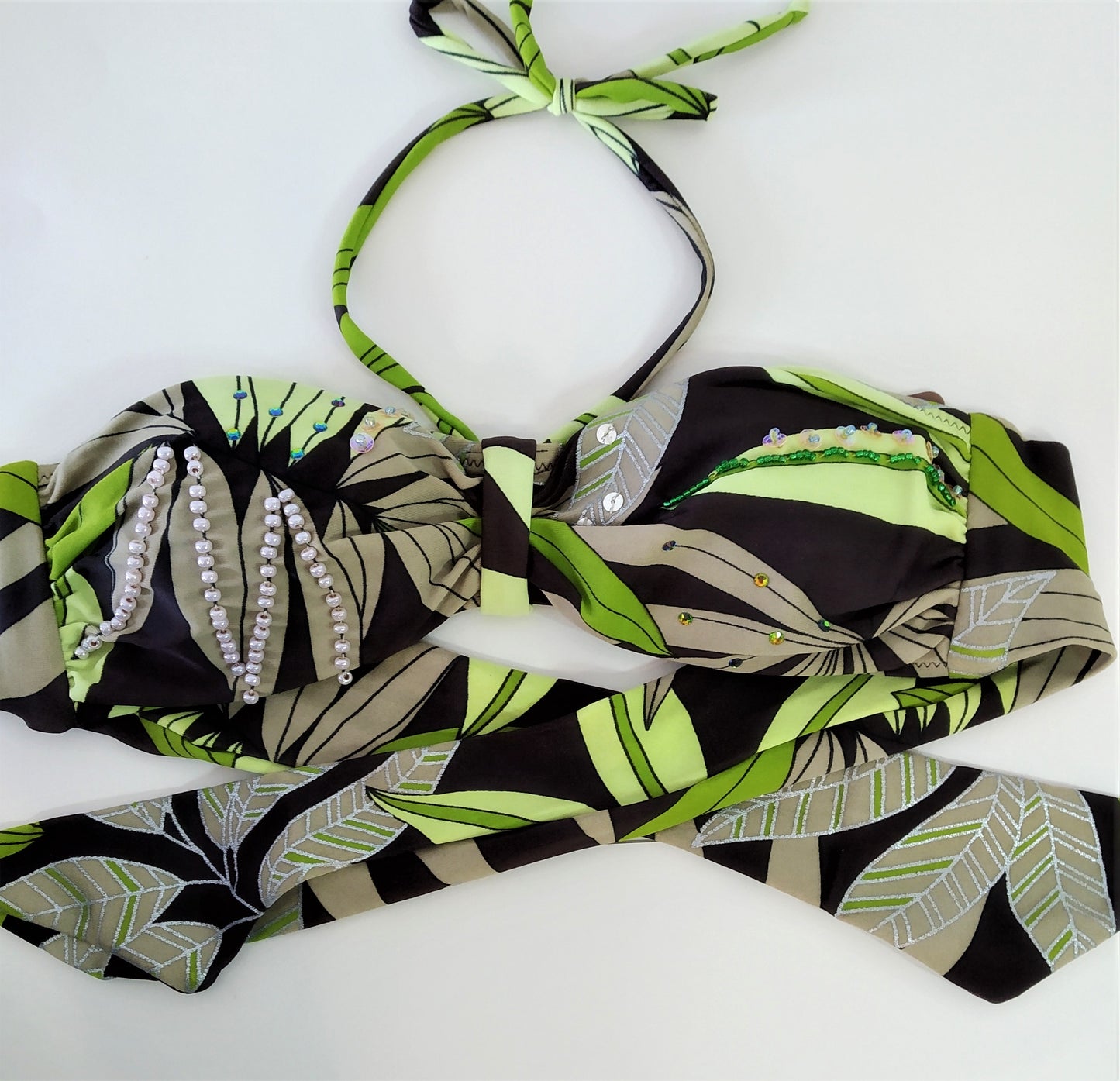 Bikini strapless bra of Strapless bikini set bandeau print with green leaves on brown background Embellishment: handwork of embroidered beads and sequins. bikinn.com