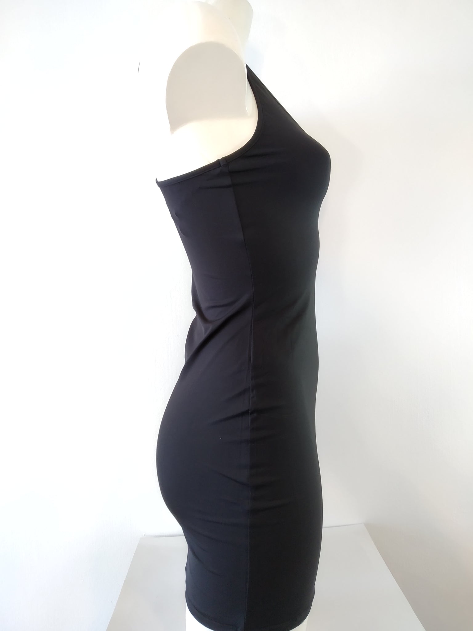 side view of lycra tank dress slim cut, mini,tight on the body, 4 colors: hot pink, black, blue, orange. bikinn.com