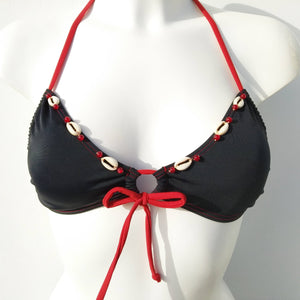 reversed black triangular bikini bra with few  seashells sewn for decoration along the neckline . bikinn.com