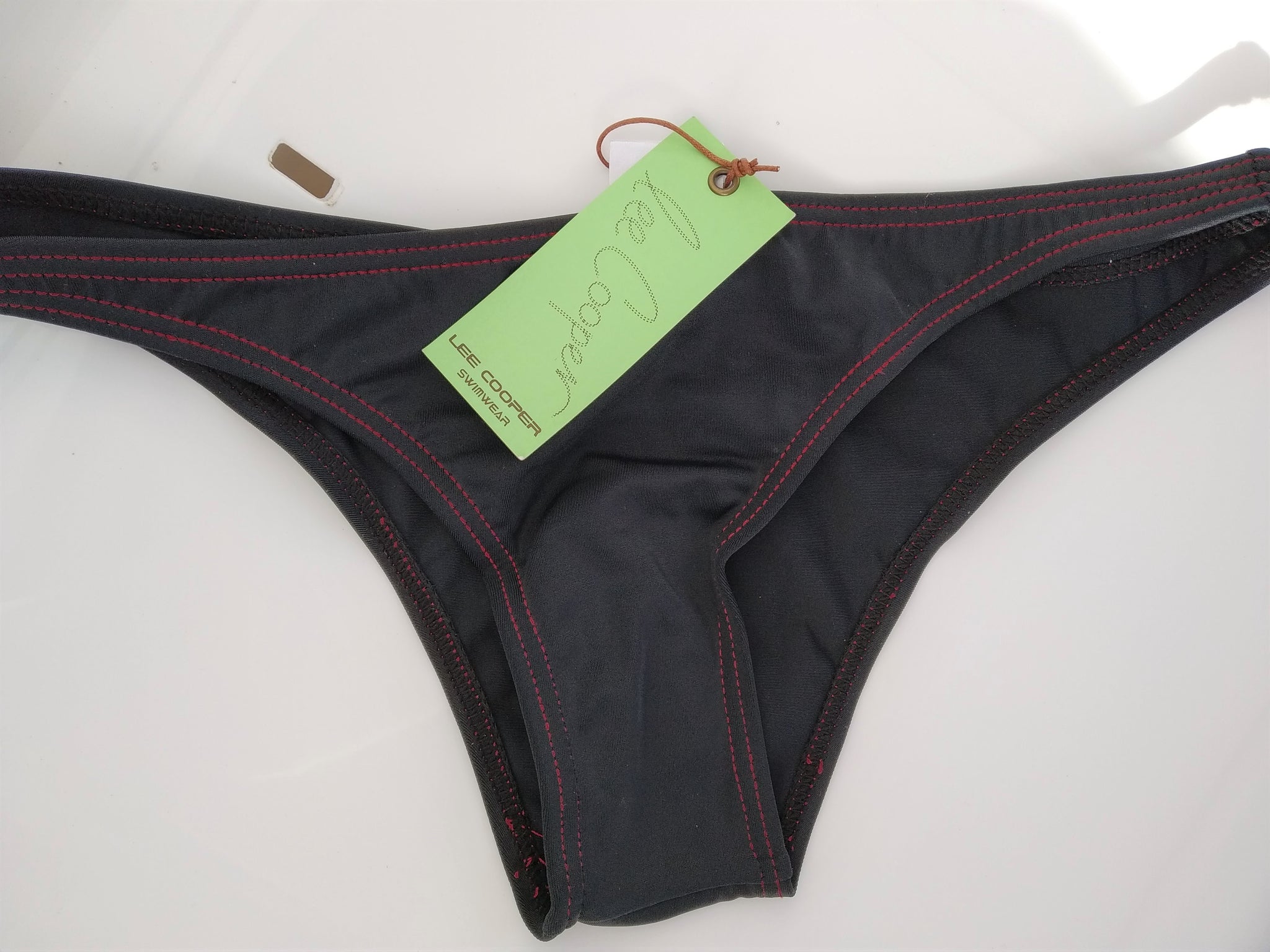 Back view of a black brazilian bikini bottom . bikinn.com