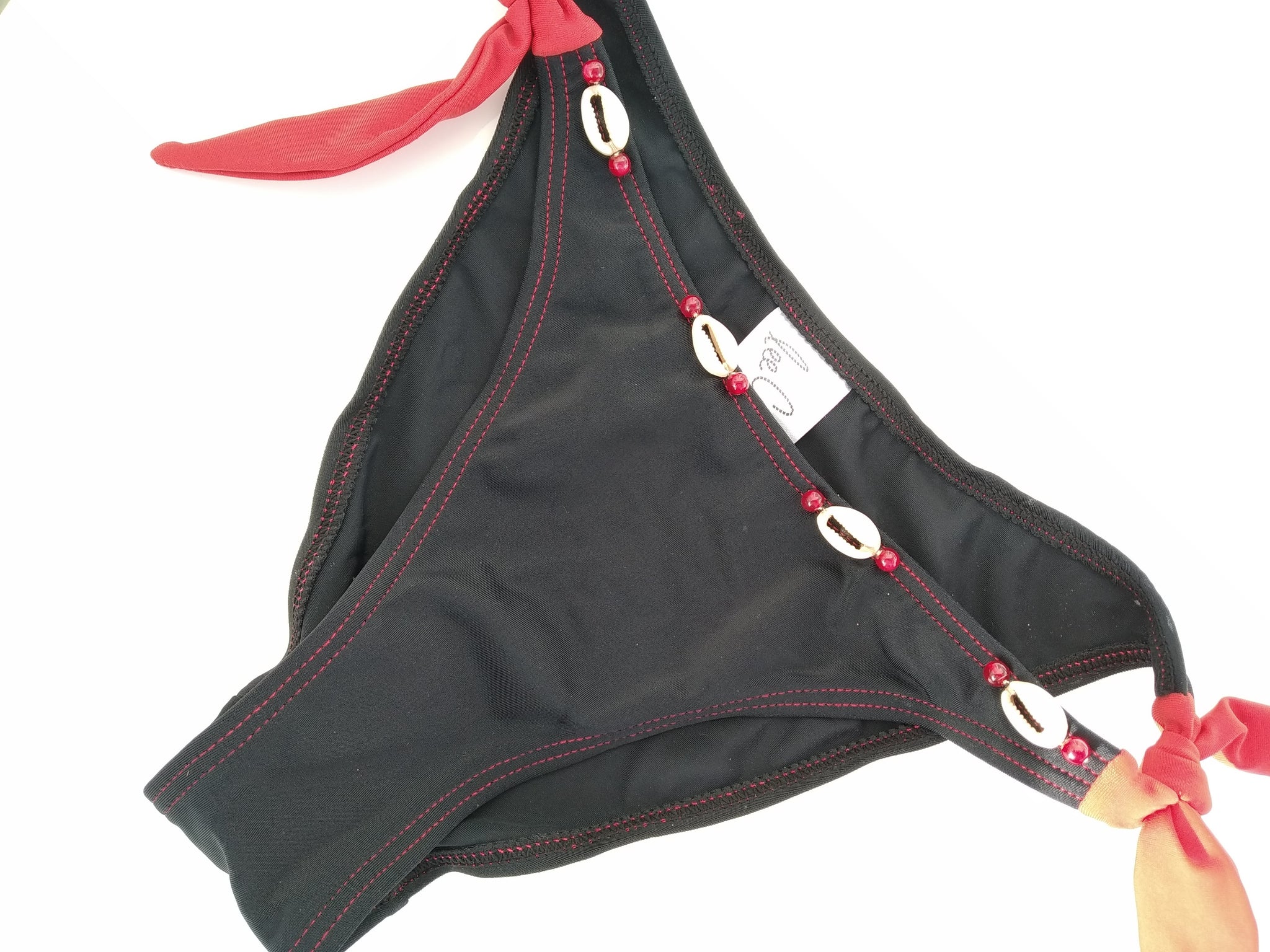 Black tie side bikini bottom, seashell decoration, mix and match collection. bikinn.com