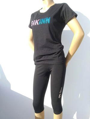 photo of manequin wearing black outfit set, short sleeves t-shirt and 3/4 length leggings, with transfer rhinestones, bling-bling collection. bikinn.com