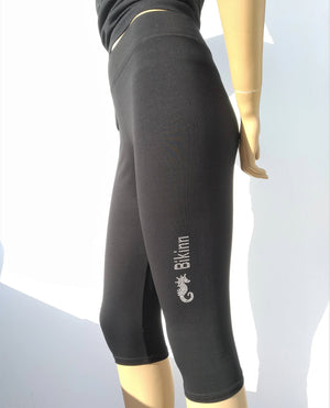 photo of black 3/4 length leggings, with transfer rhinestones, bling-bling collection. bikinn.com
