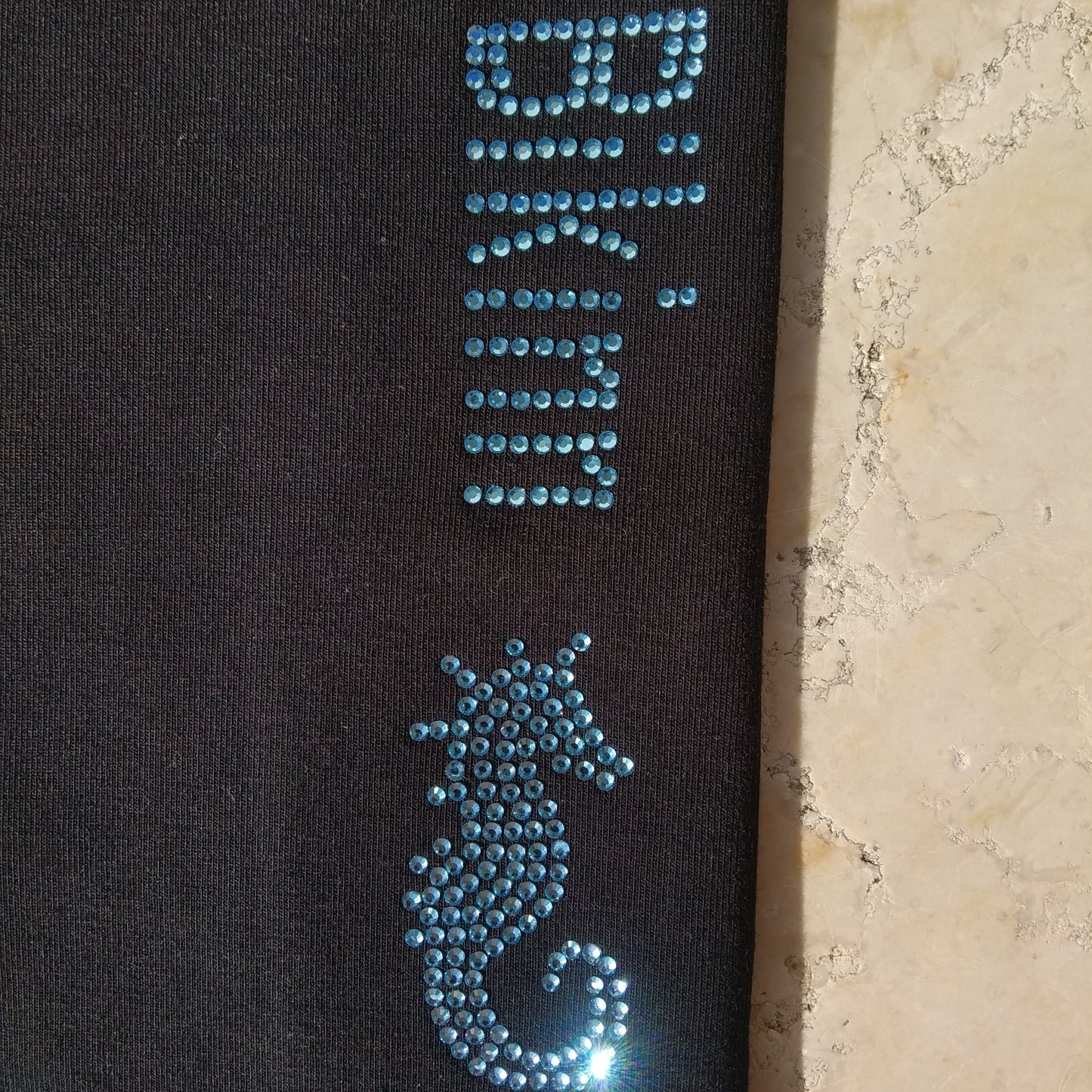 exhibition of a design by rhinestone print for black leggings, bling-bling collection. bikinn.com